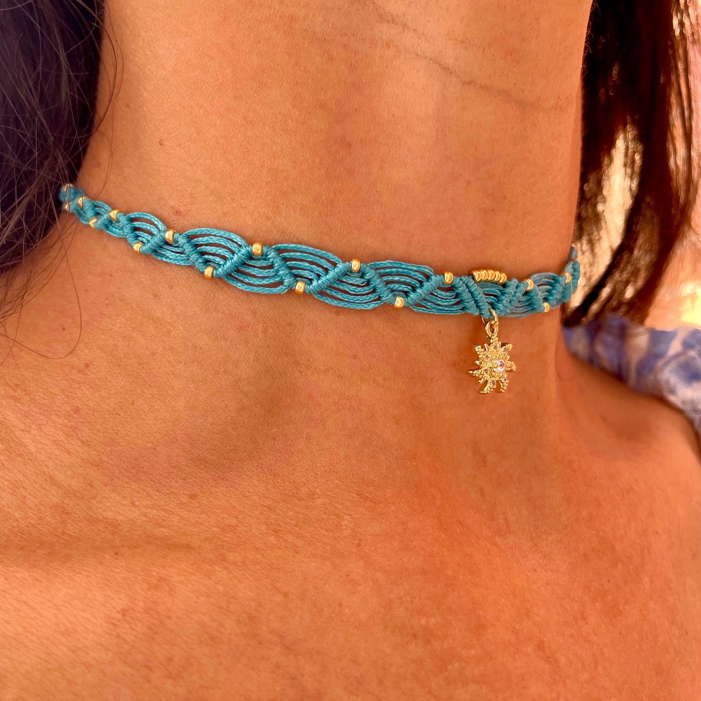 Collana turchese con ciondolo Sole